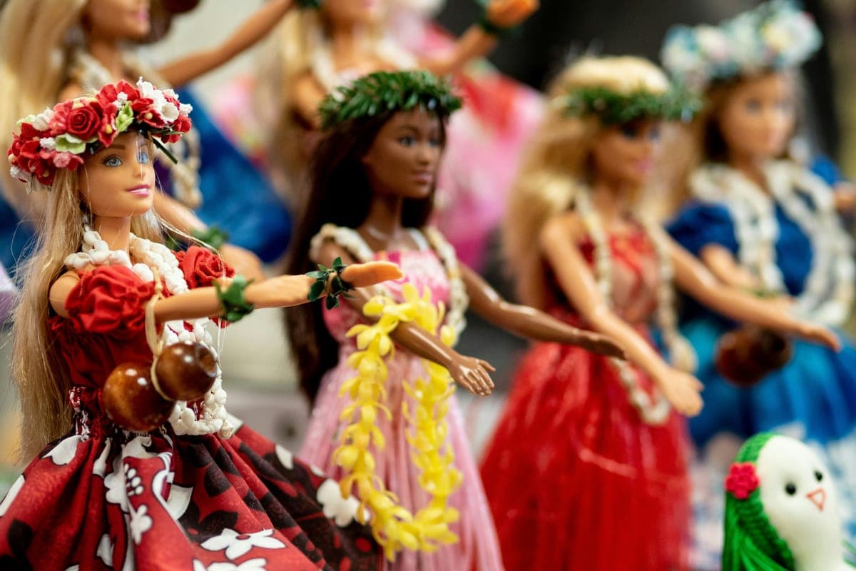 Doll and figure collection on display